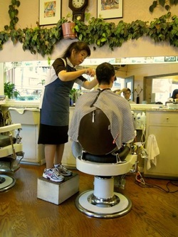 Karen McCann, San Franisco, CA, haircut in Kim's Barber Shop