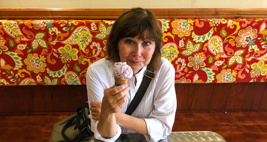 Sacramento's Cornflower Creamery / Karen McCann Enjoying Pride Confetti Ice Cream / Rich McCann  / EnjoyLivingAbroad.comPicture