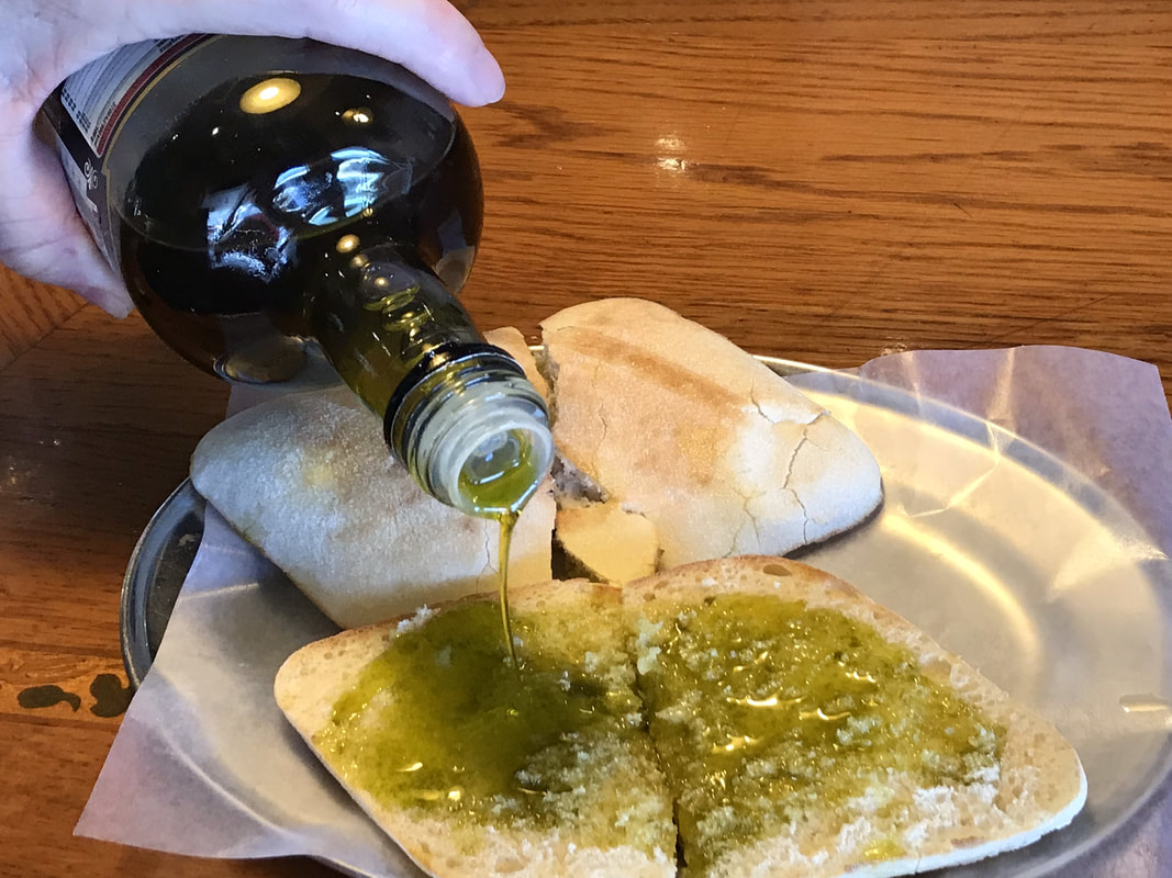 Olive oil doesn't make you fat / Olive oil tasting / Seville, Spain / Karen McCann / EnjoyLivingAbroad.com