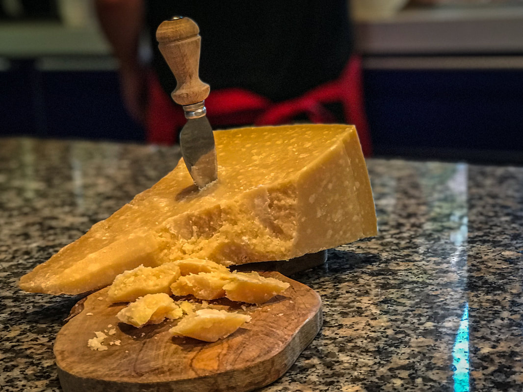 Parmigiano-Reggiano cheese / Parma, Italy / The Secret Life of Parmesan Cheese / Mediterranean Comfort Food Tour / Karen McCann / EnjoyLivingAbroad.com